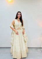 Gold Tissue Lehenga with Waistcoat-Style Blouse