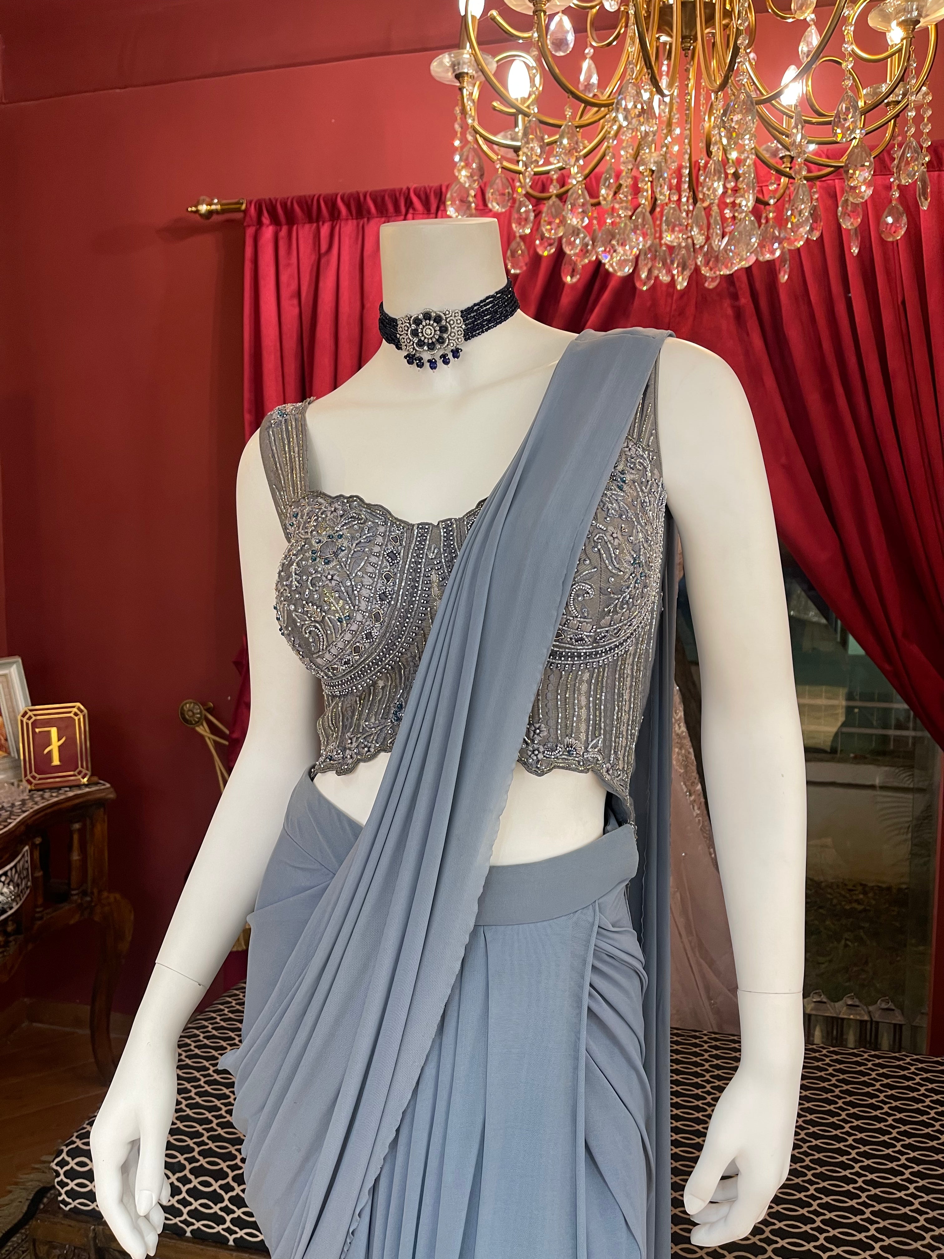 Powder Blue Pre Pleated Saree with Handwork Corset Blouse