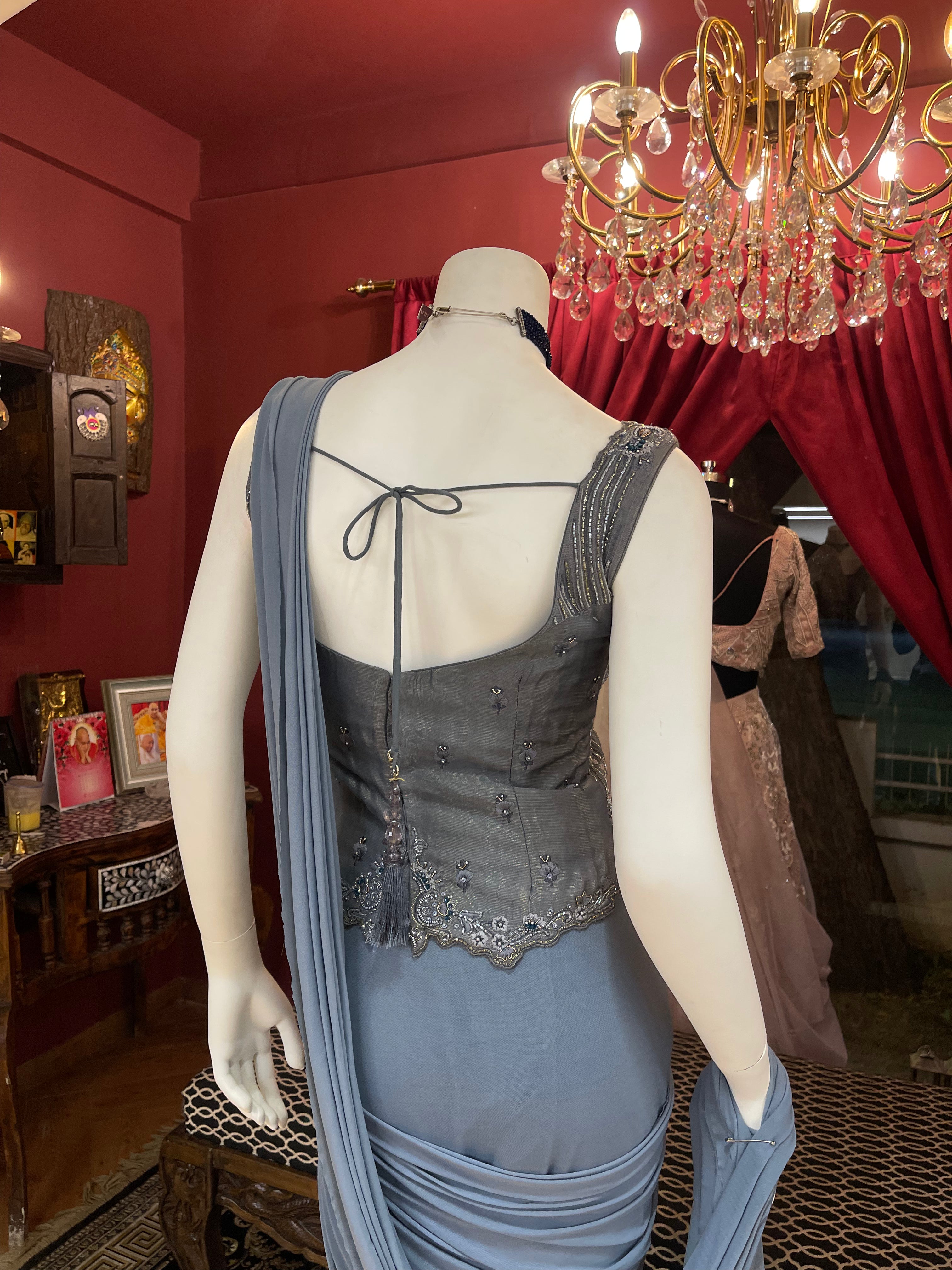 Powder Blue Pre Pleated Saree with Handwork Corset Blouse