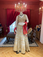 Ivory Tissue Lehenga With Full Handwork Blouse And Red Leheriya Dupatta
