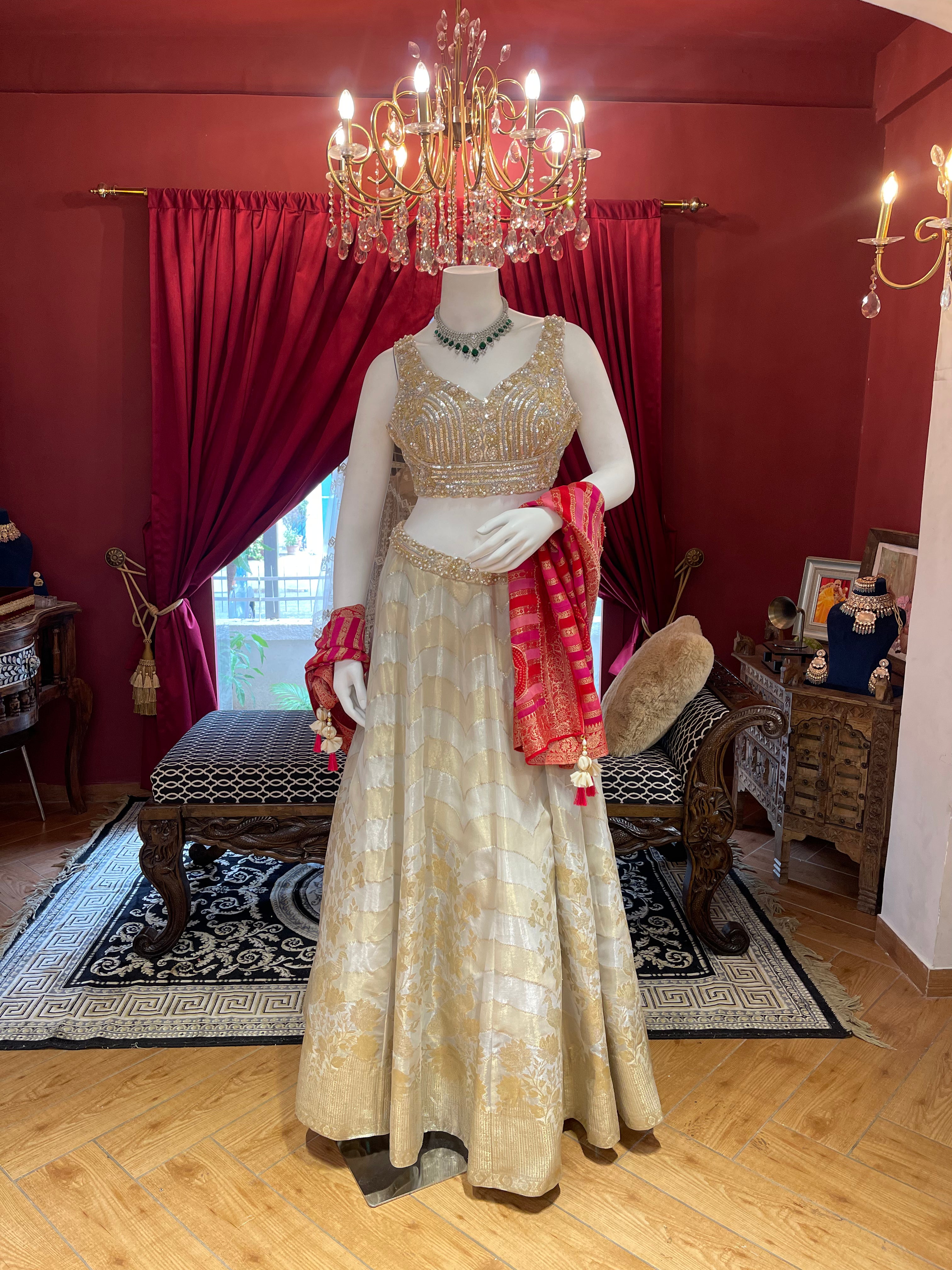 Ivory Tissue Lehenga With Full Handwork Blouse And Red Leheriya Dupatta