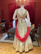 Ivory Tissue Lehenga With Full Handwork Blouse And Red Leheriya Dupatta