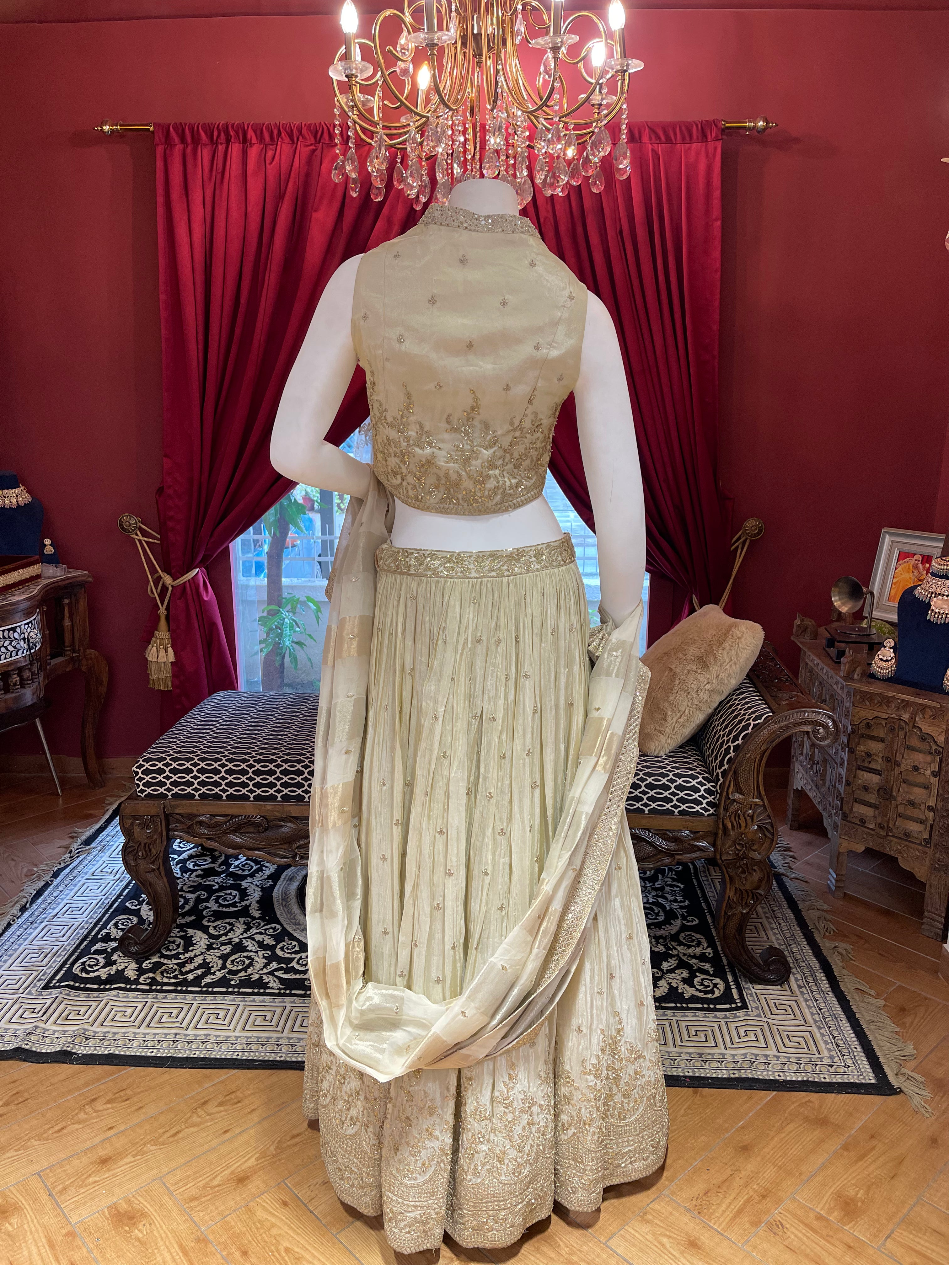 Gold Tissue Lehenga with Waistcoat-Style Blouse