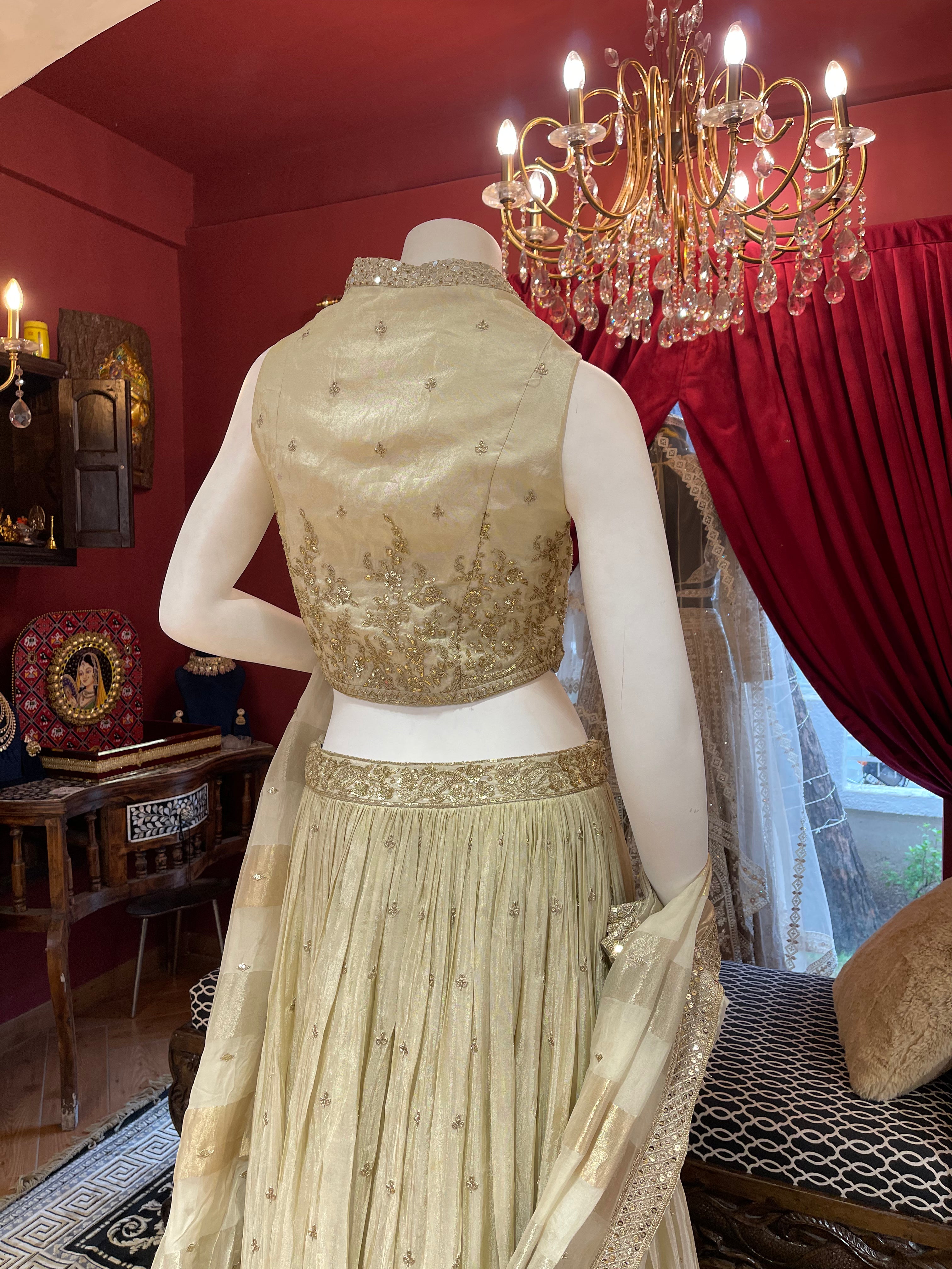 Gold Tissue Lehenga with Waistcoat-Style Blouse