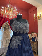 Midnight Blue Pleated Gown with Silver Leaf Embellishments