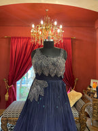 Midnight Blue Pleated Gown with Silver Leaf Embellishments