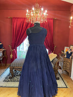 Midnight Blue Pleated Gown with Silver Leaf Embellishments
