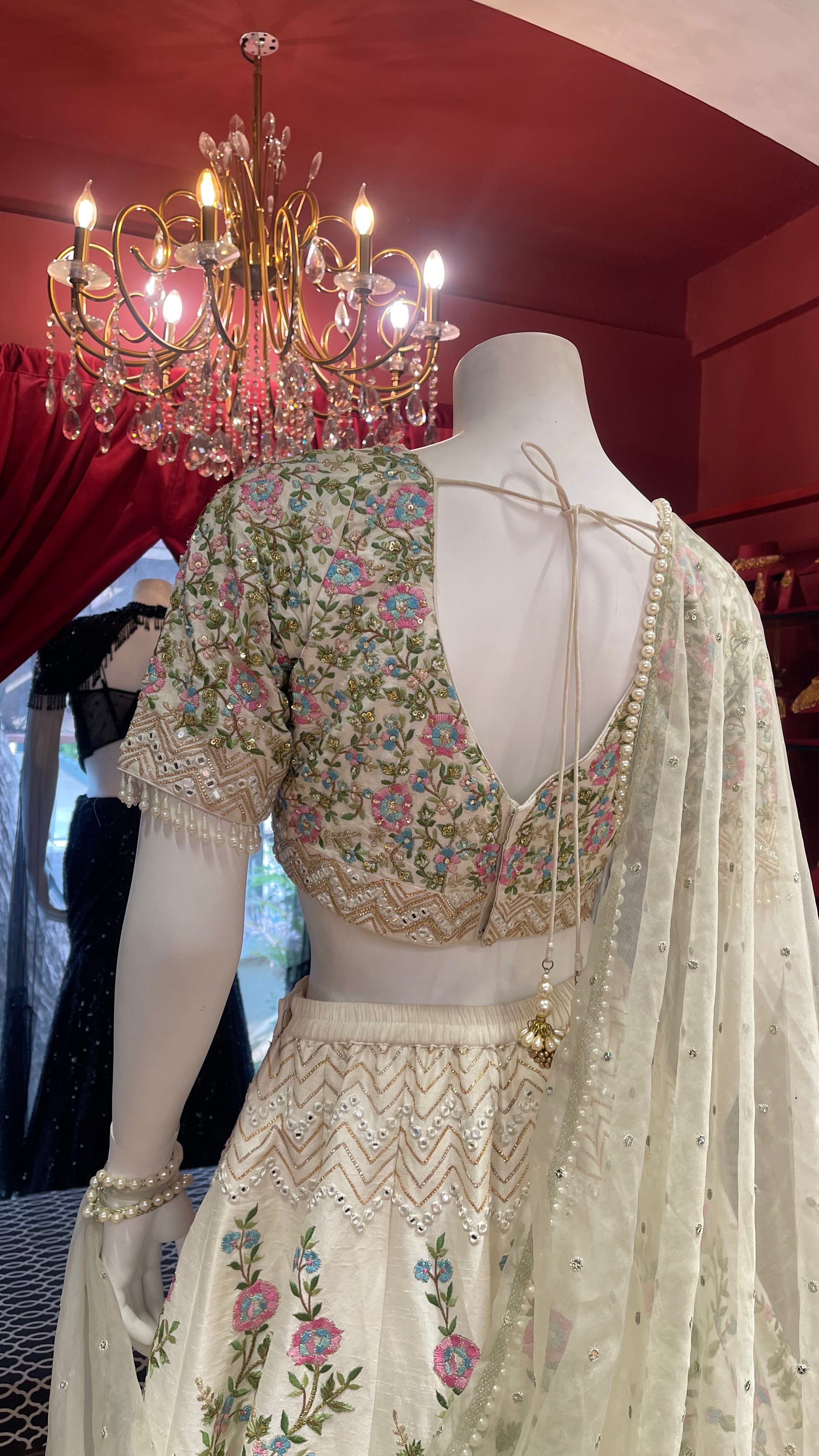 White Lehenga With Colourful Floral Embroidery