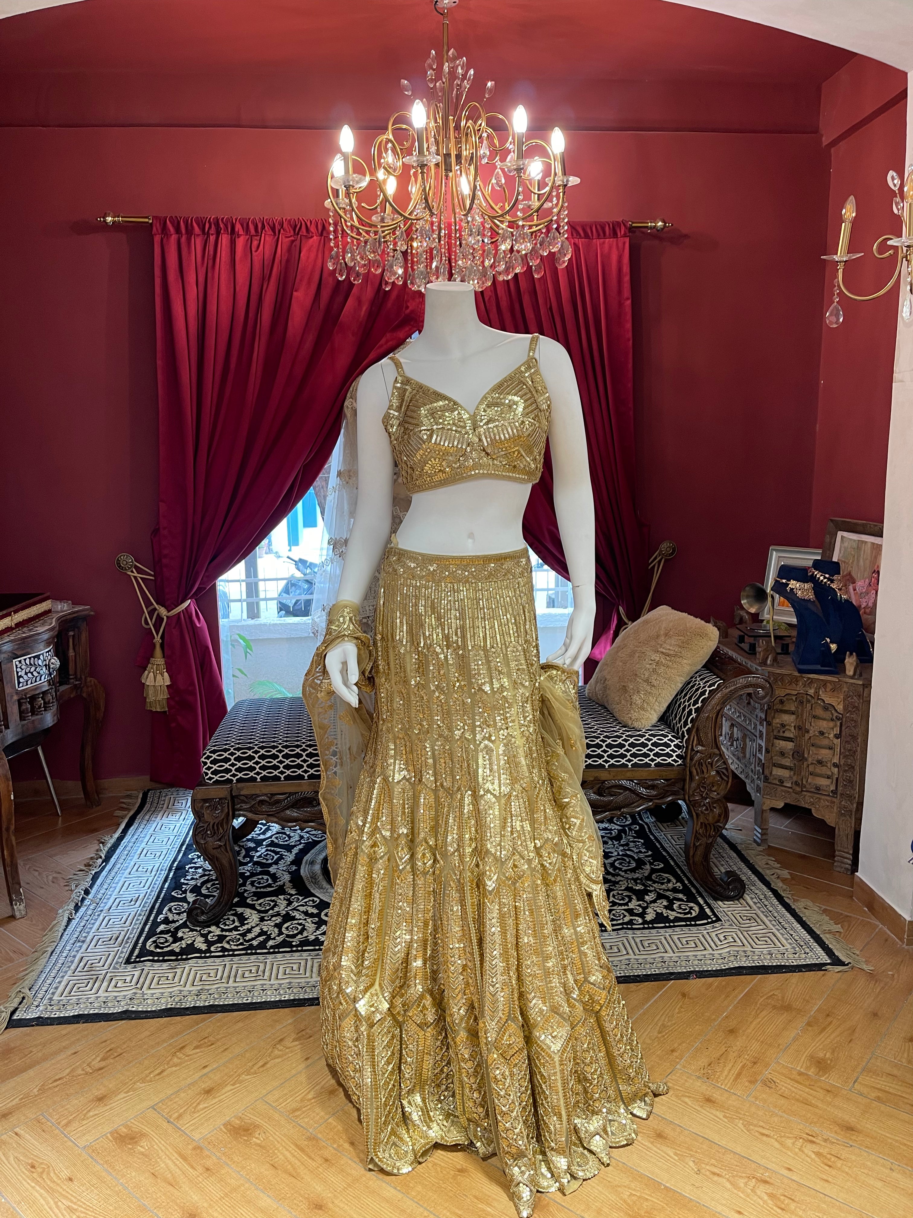 Golden Aura Fishcut Lehenga With Shimmering Sleeveless  Blouse