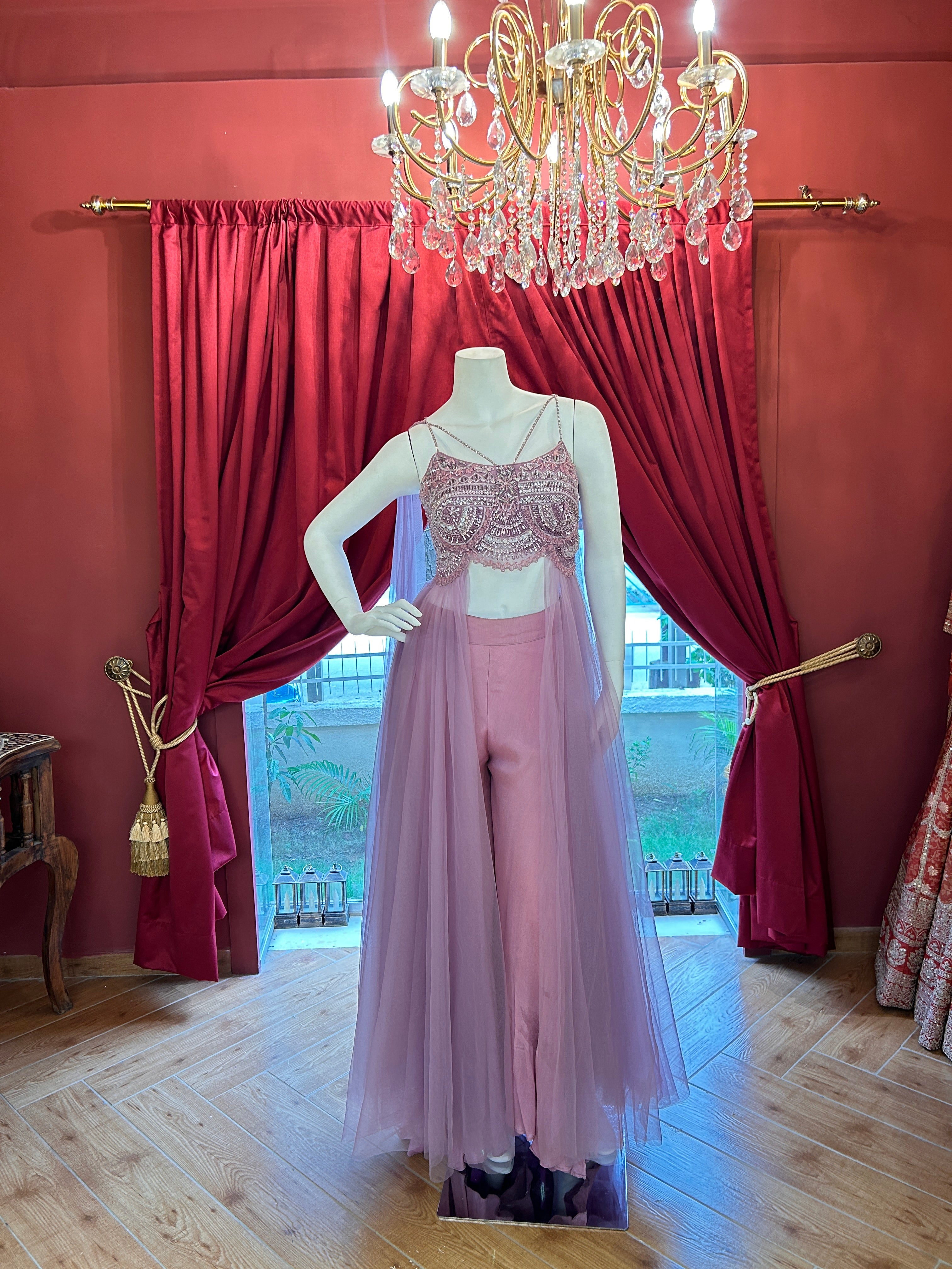 Pink hand-embroidered crop top paired with sleek straight-fit pants