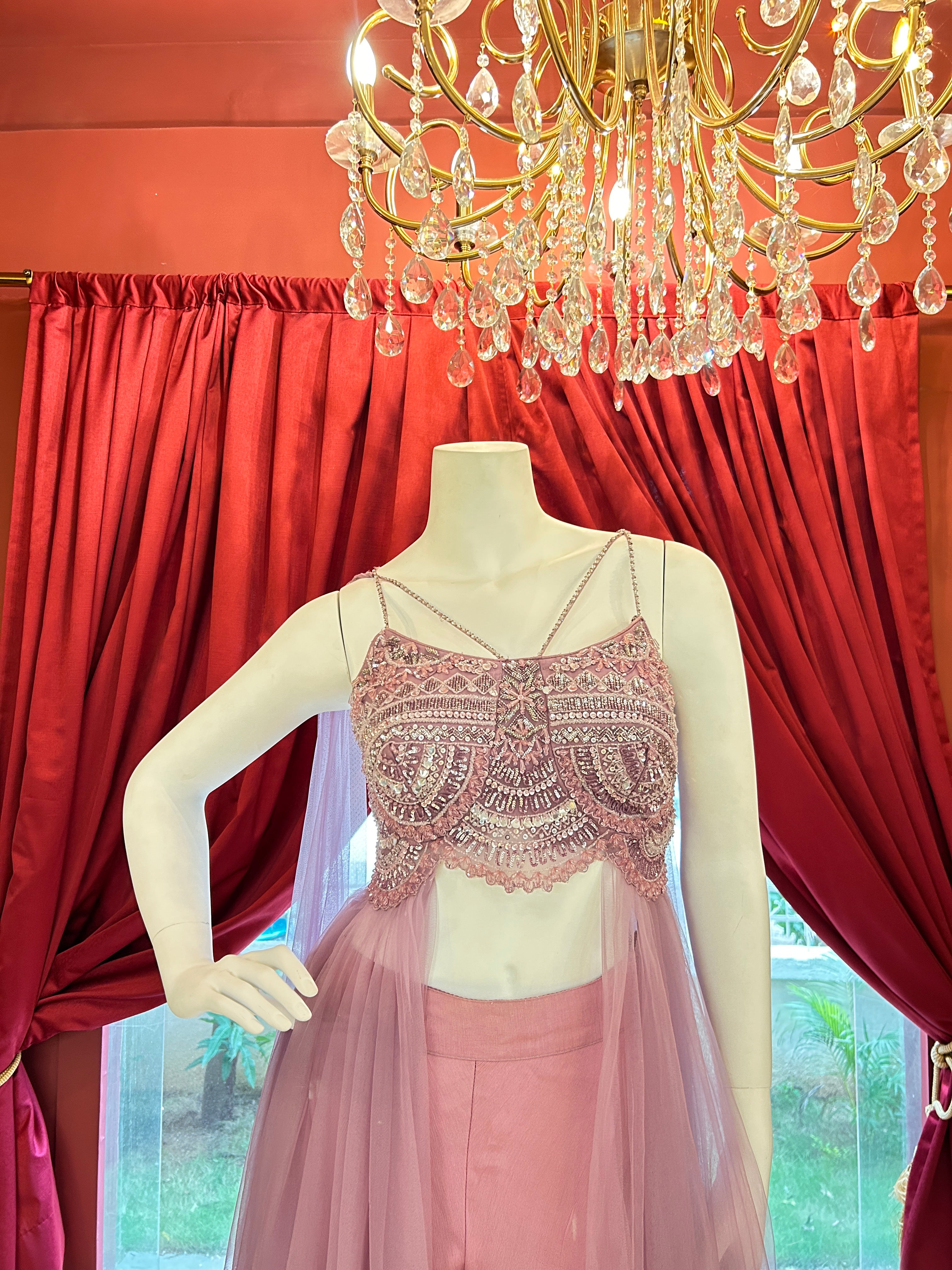 Pink hand-embroidered crop top paired with sleek straight-fit pants