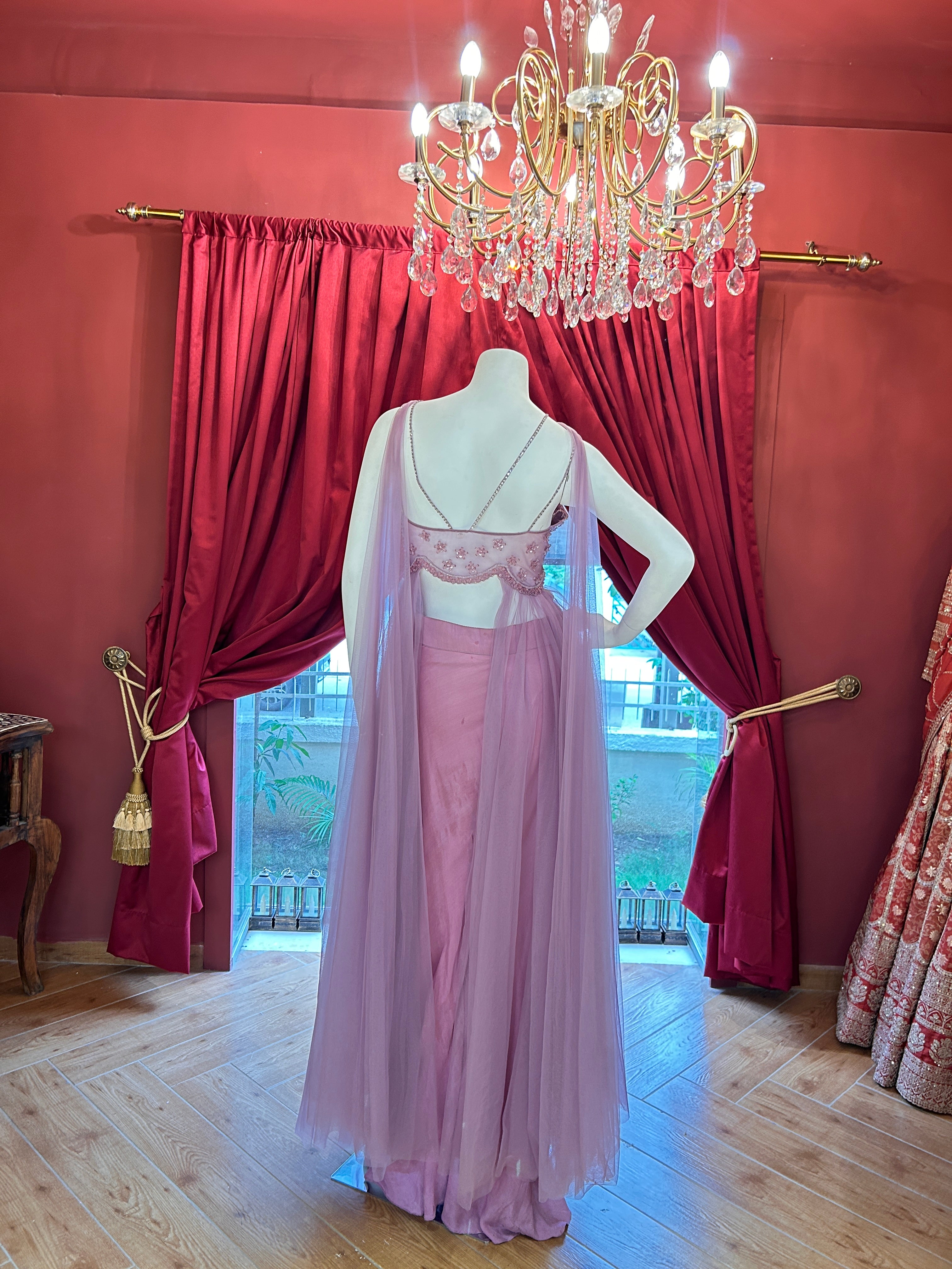 Pink hand-embroidered crop top paired with sleek straight-fit pants