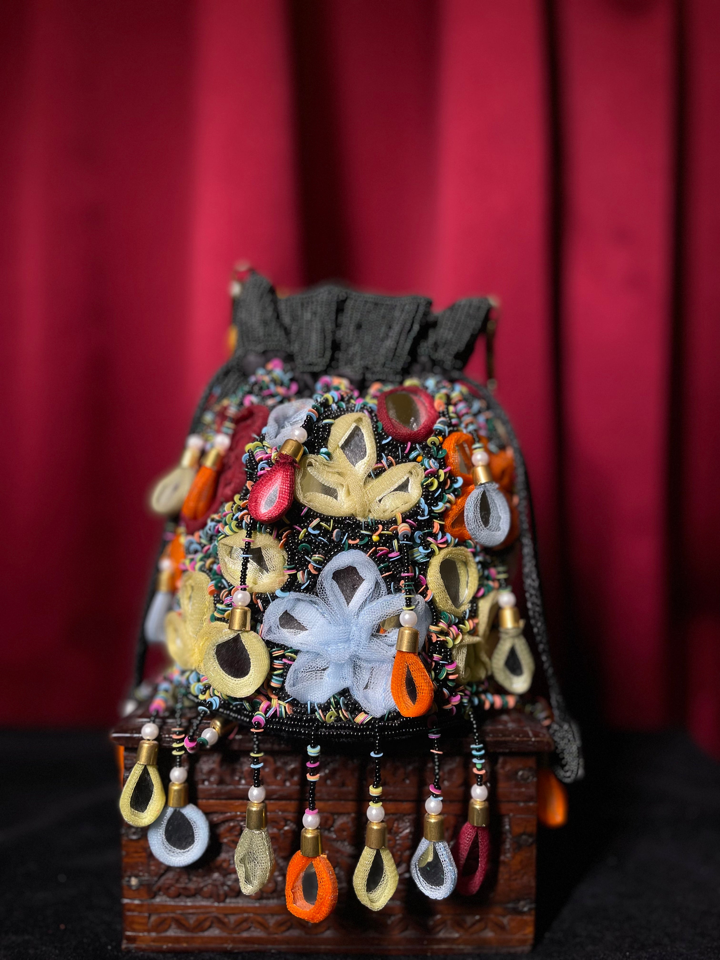 Black Potli With Colourful Mirror Tassels