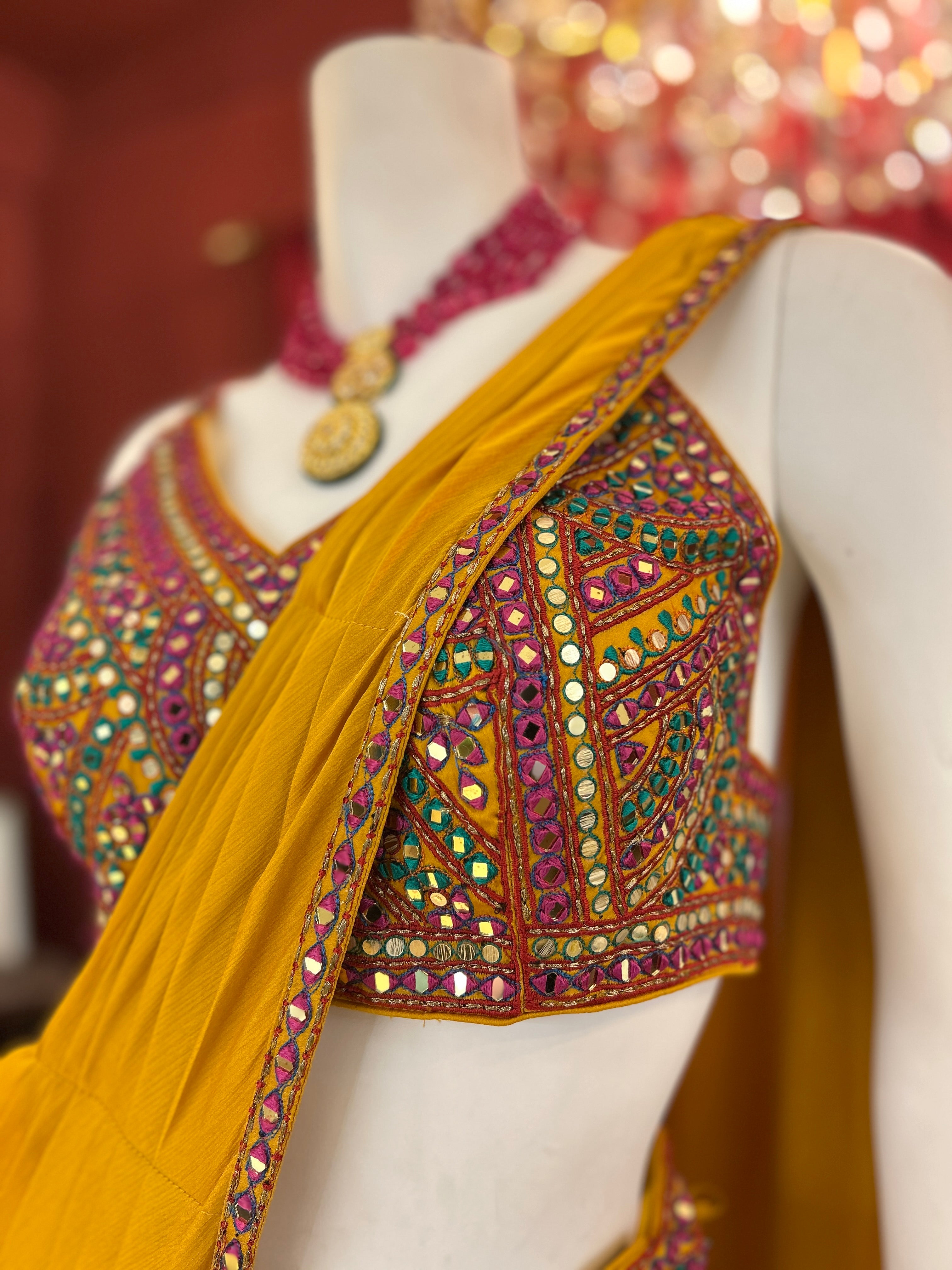 Mustard Draped Saree wih Colourful Blouse