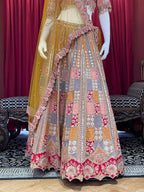 Multi-Color Geometric Patchwork Bridal Lehenga Set with Mustard Net Dupatta