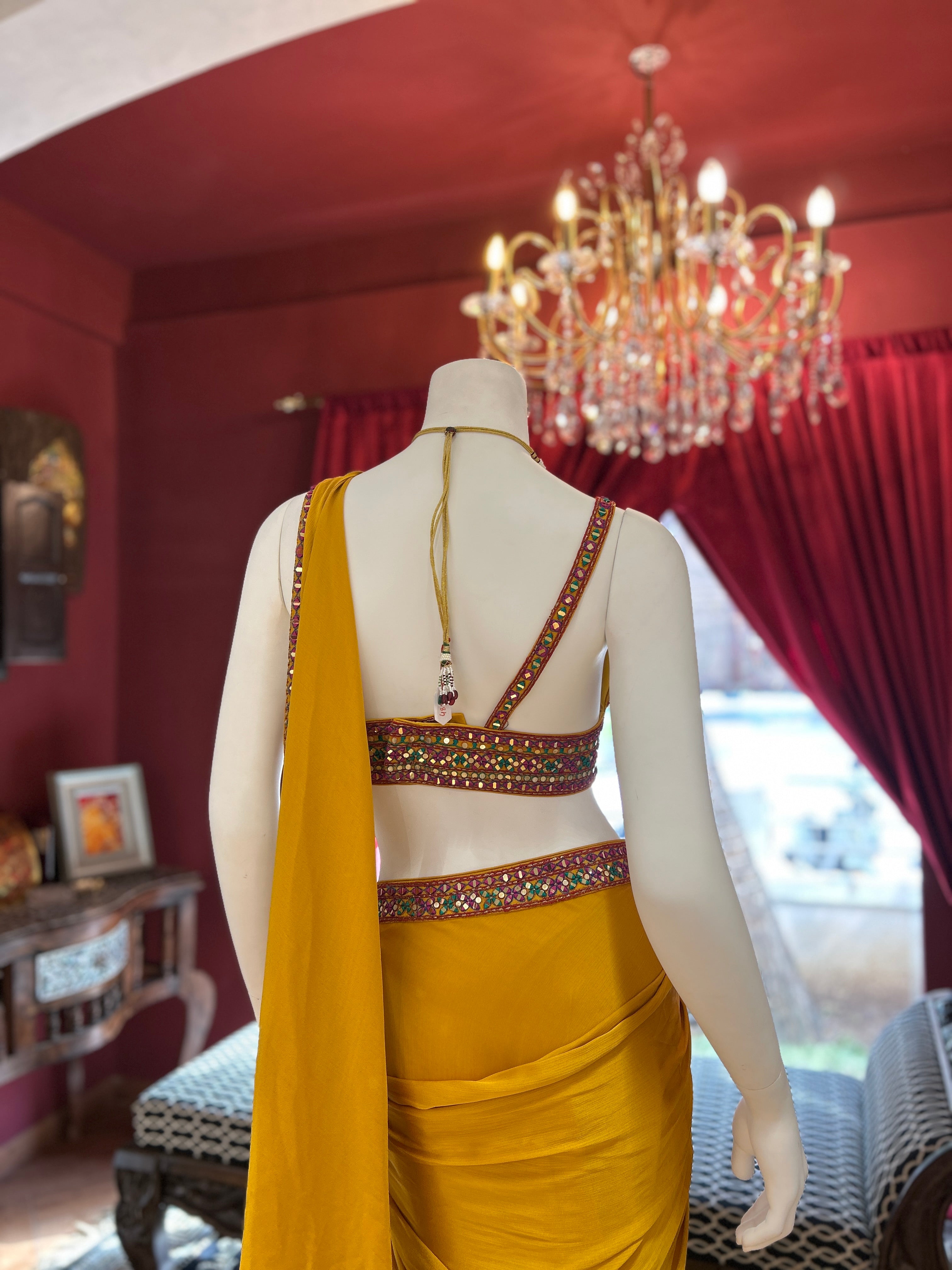 Mustard Draped Saree wih Colourful Blouse