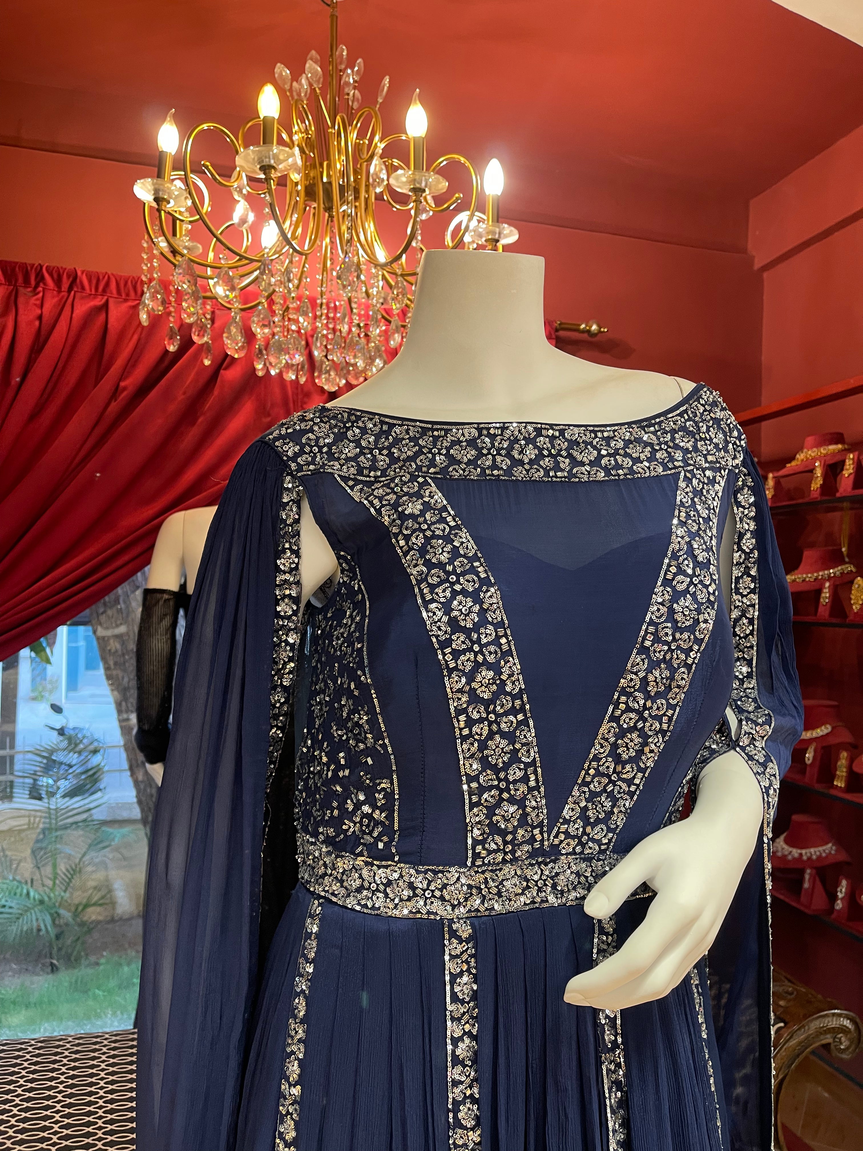 Blue cape style sleeves gown
