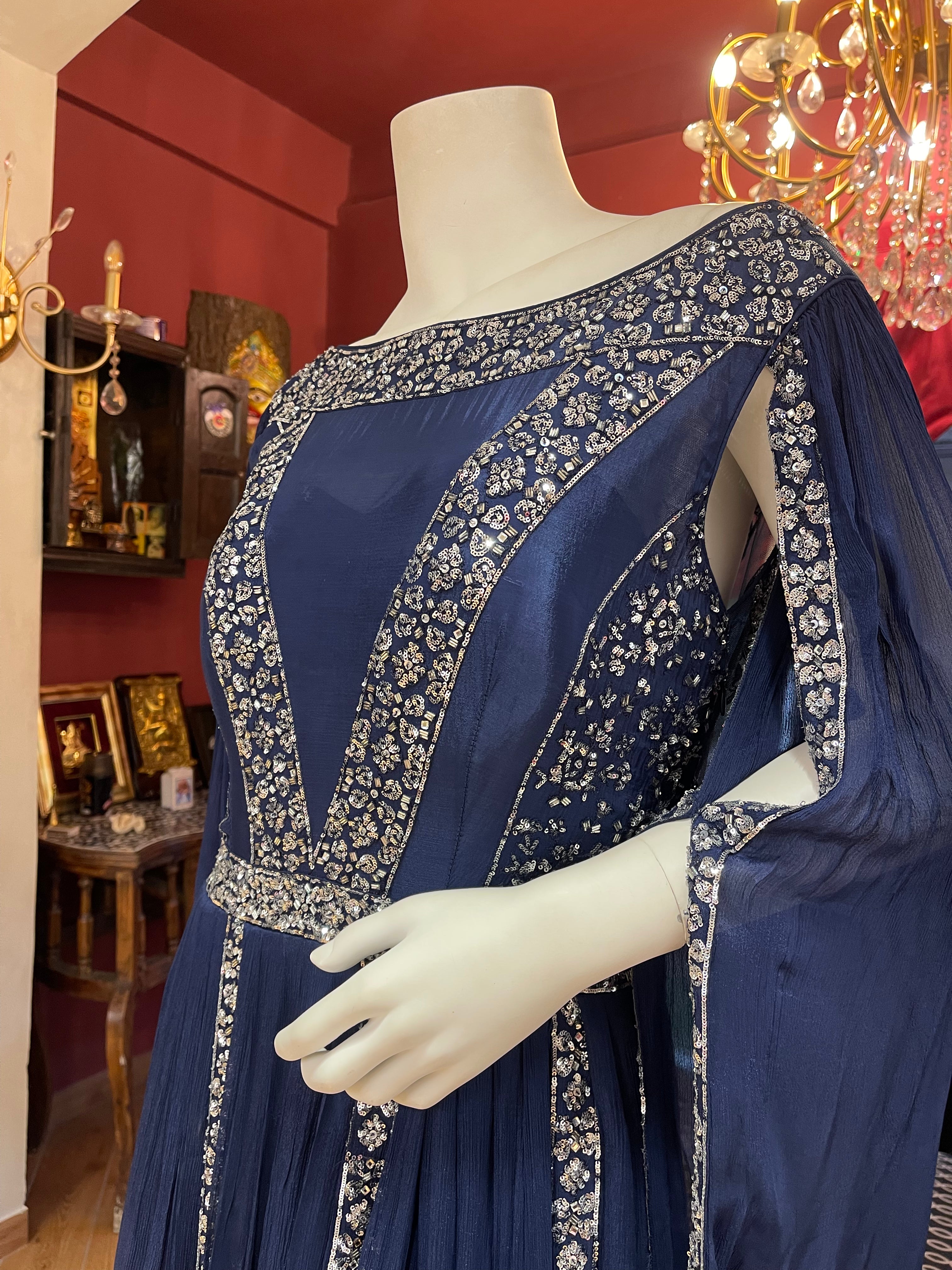 Blue cape style sleeves gown