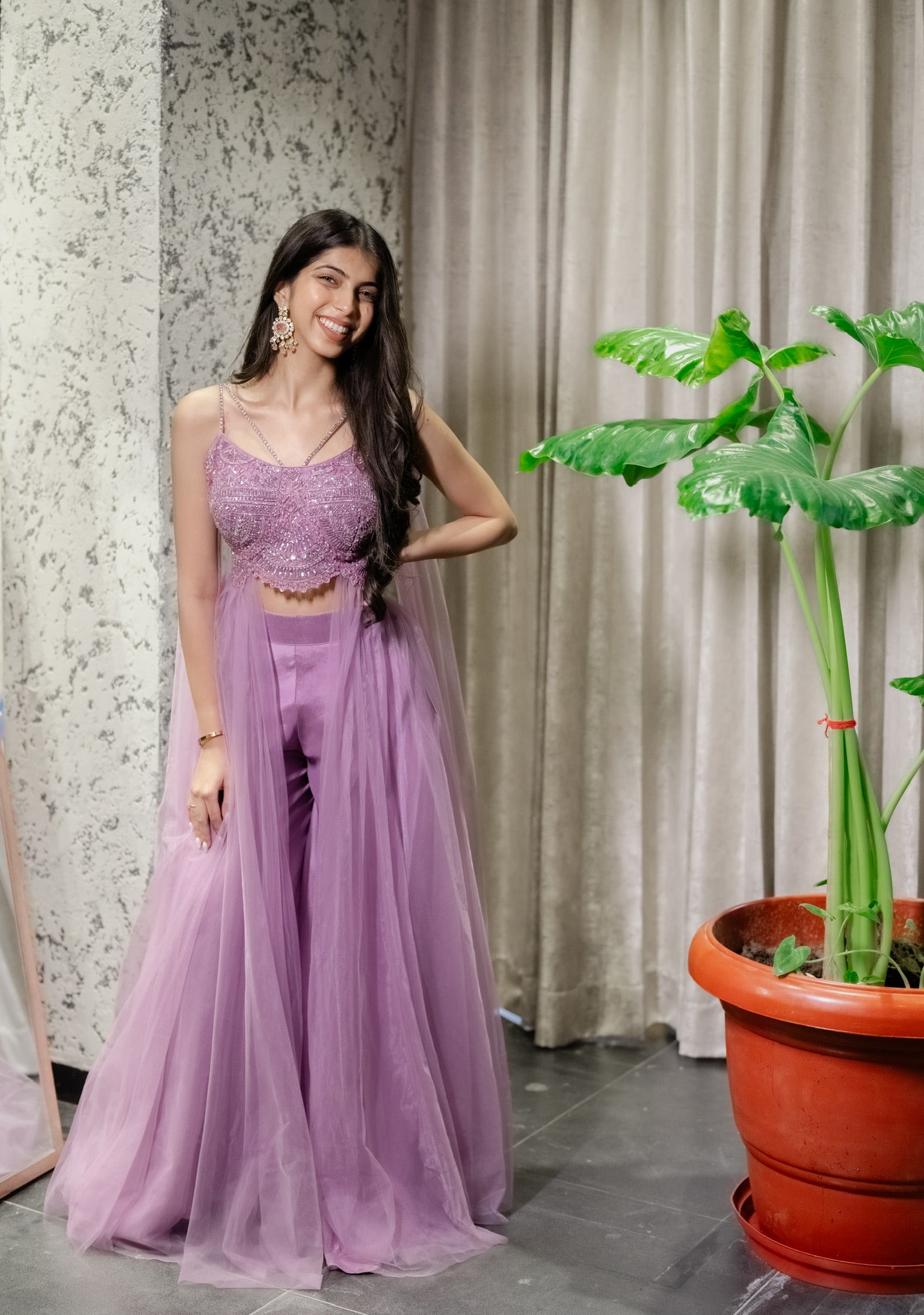 Pink hand-embroidered crop top paired with sleek straight-fit pants
